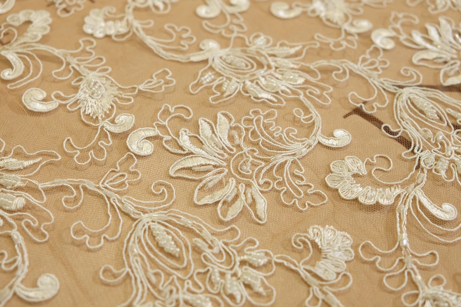 lace fabric with cord and embroidery pattern 310848