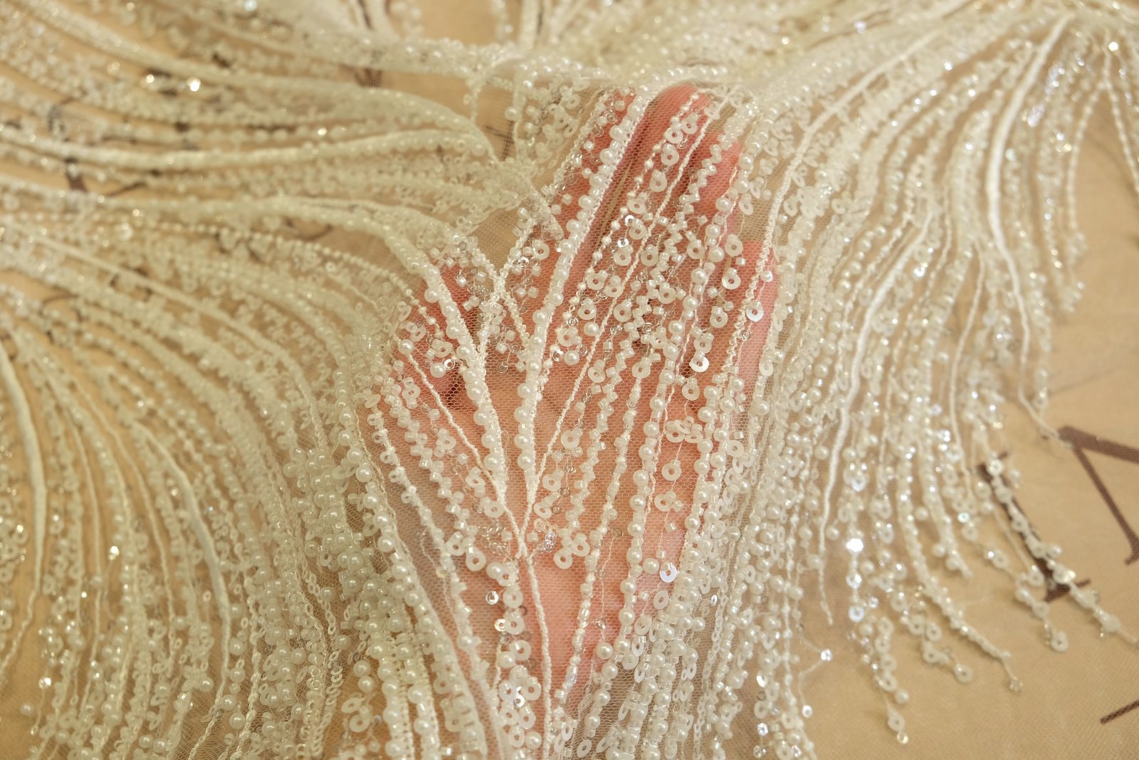 embroidered lace fabric on hand 378824