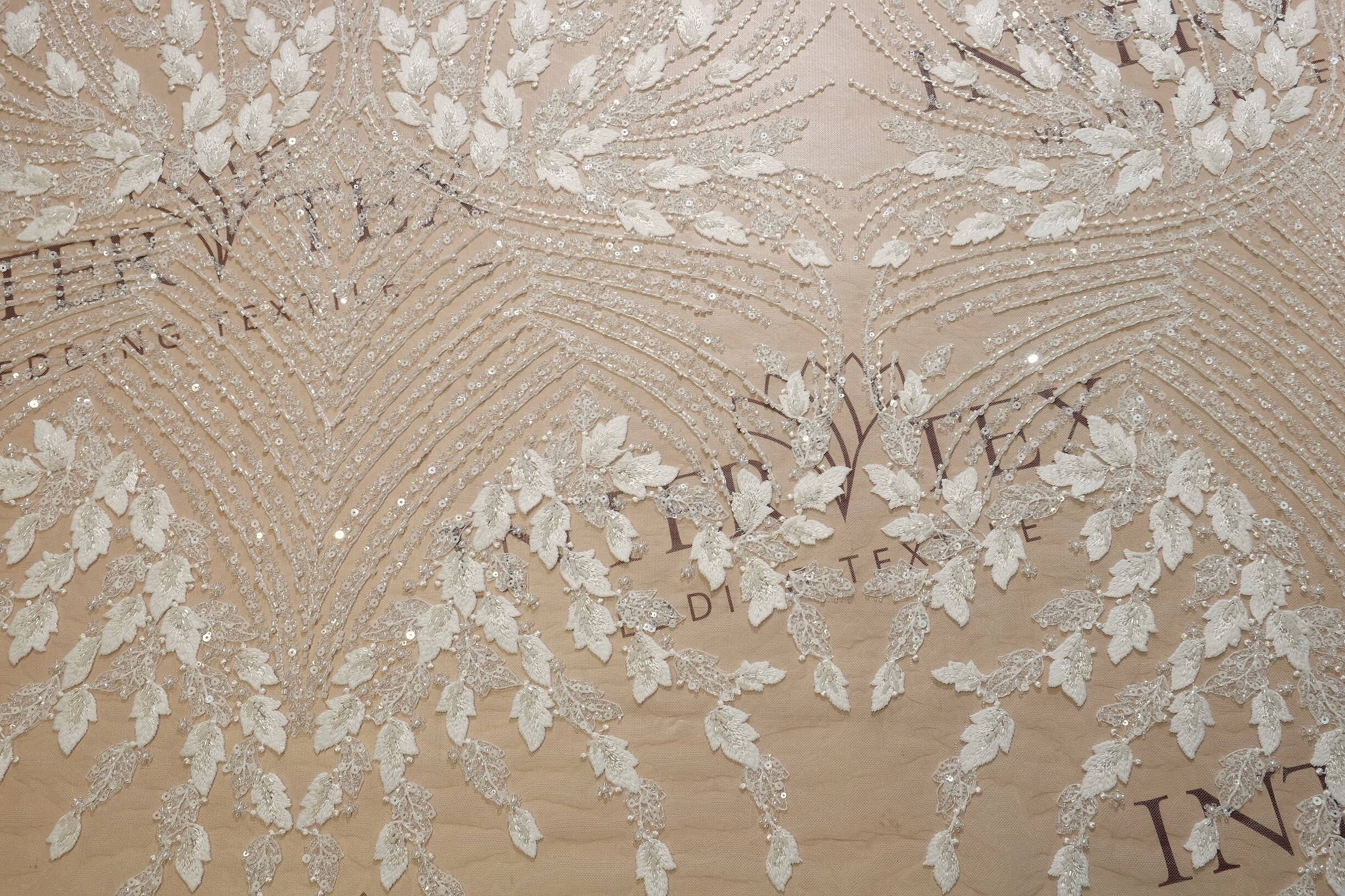 Embroidered fabric 2000000381923 image from the Inter Tex catalogue for bridal fabrics, lace, appliques and B2B atelier orders.