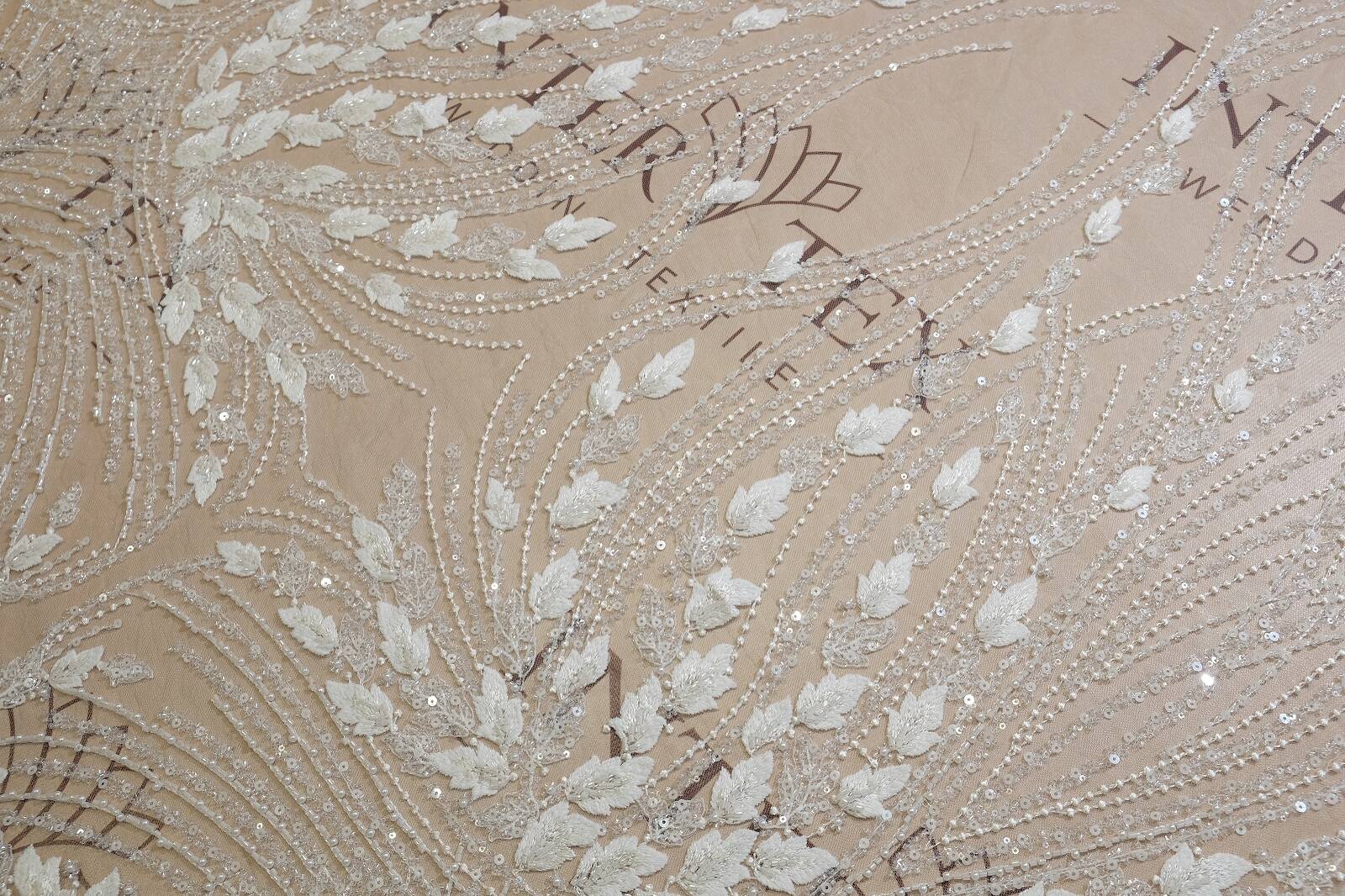 Embroidered fabric 2000000381923 image from the Inter Tex catalogue for bridal fabrics, lace, appliques and B2B atelier orders.