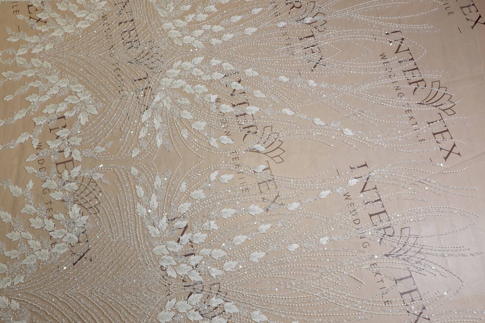Embroidered fabric 2000000381923 image from the Inter Tex catalogue for bridal fabrics, lace, appliques and B2B atelier orders.