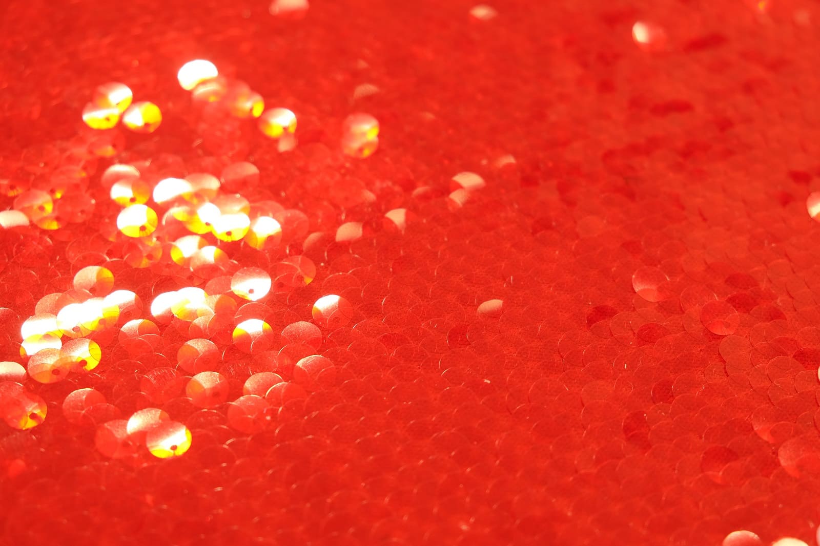 wet-look red sequins close-up 386423